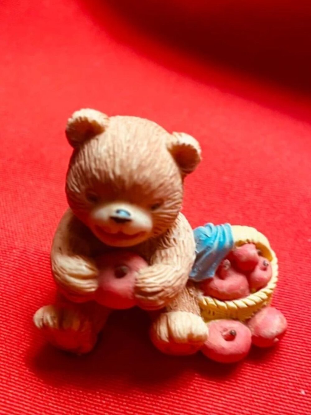 Bear with basket of apples